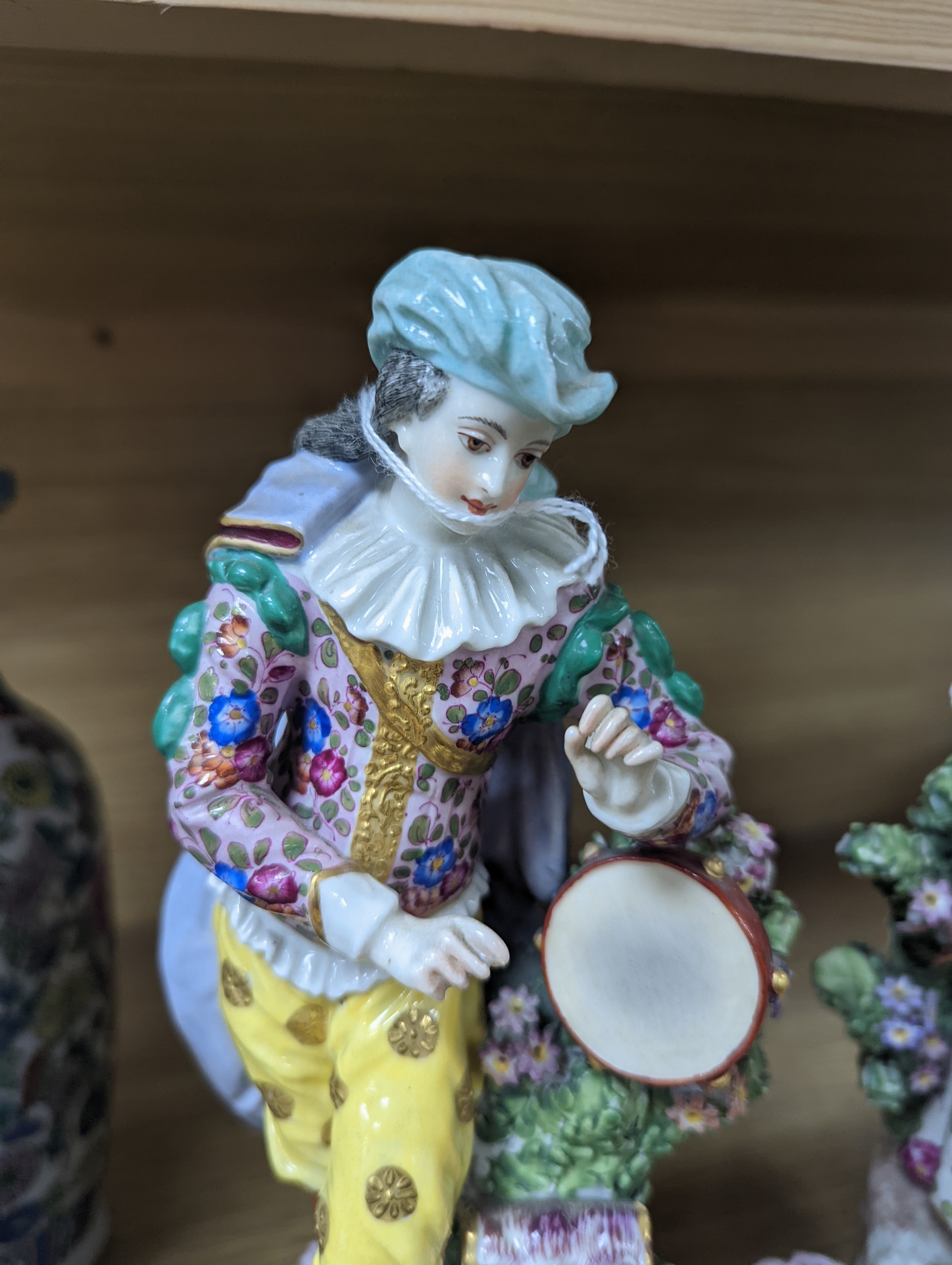 Two Continental porcelain figures, a lady and a gent 27cm